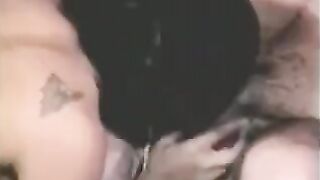 A guy has sex with his girlfriend using a strapon