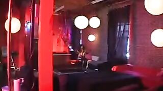 Black woman in a latex suit fiercely rides a member