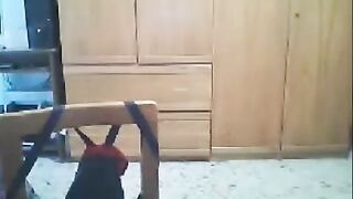 A woman fucks in front of a webcam with her husband
