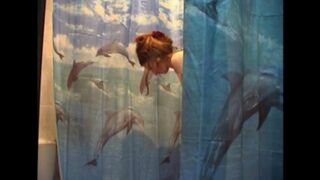 The husband shoots his naked wife in the bathroom