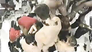 A crowd of guys fucked a girl with big tits hard
