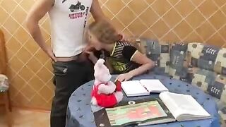 Instead of studying, a schoolgirl gets fucked in the kitchen