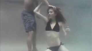 Redhead beauty making love with her partner in the pool