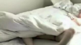 A girl masturbates, not aware of the hidden camera
