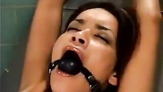 A bald guy fucked a girl using a sex machine