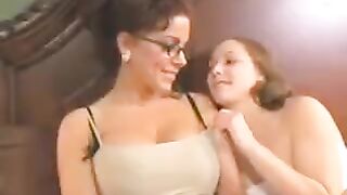 A mother introduces her daughter to the joys of sex