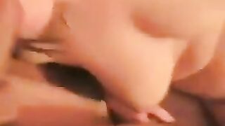 The girl spreads her legs to show everyone her naked pussy with a protruding clitoris
