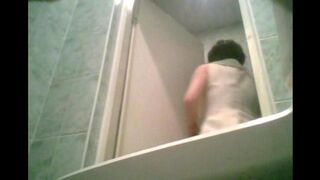 A hidden camera in the toilet catches a graduate peeing