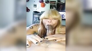 Black beauty put a condom on the guy's dick and sucked it