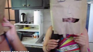 The girls wear bags on their heads and have sex with guys