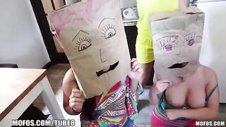 The girls wear bags on their heads and have sex with guys