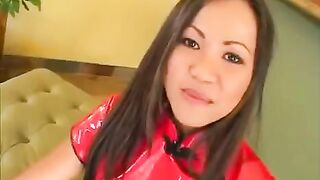 A pretty Korean girl makes a blowjob for two guys in this hot video