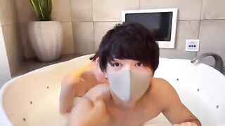 Japanese guy's slippery handjob with lotion ends in cum shot