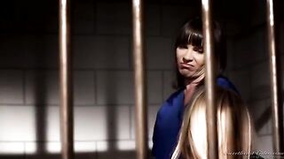 Two lesbian prisoners are fucking in their cell, showcasing intense passion