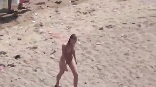 A hot pair of naked people in the middle of the sea