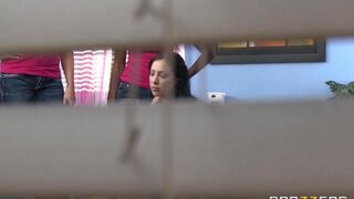 A young couple has fun at the dormitory of the college without hiding
