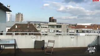 Sex on the roof with a stunning brunette and her impressive assets