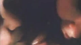 A vintage blowjob scene featuring a woman with an insatiable appetite for cum