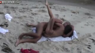 Real hidden shooting on the beach with some spicy action captured unexpectedly