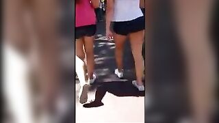 A stunning girl has an ass that can't be resisted, even by herself