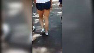 A stunning girl has an ass that can't be resisted, even by herself