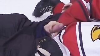 The hockey fan gave the player her ass to play with during the game