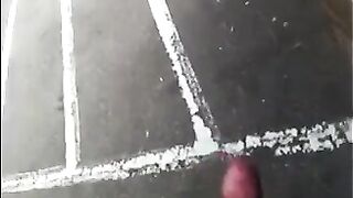 A man masturbates his cock right on the street and runs away