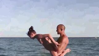 Nude gymnastics on the beach with a hot girl in HD