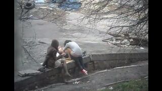The guy shoots sex with a girl on the public street