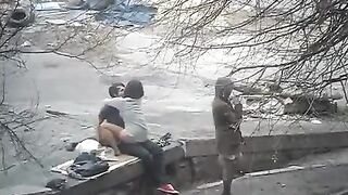 The guy shoots sex with a girl on the public street