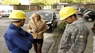 The girl in black pantyhose makes a blowjob on the set