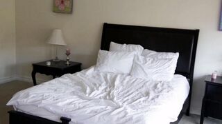 Two cute little blondies are having fun in the bedroom