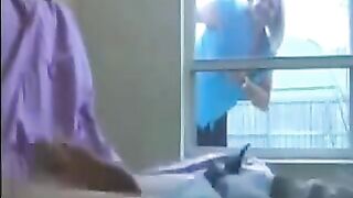 A woman peeps on a man in the ward and jerks him off with her hand
