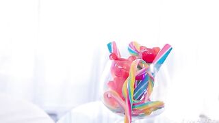 Vibrator and latex used for masturbation with a shaved cunt