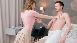 A young couple have a heart-to-heart in the bedroom