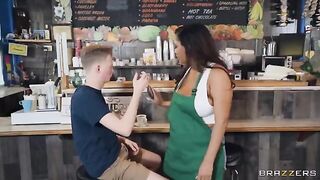 Busty barista with big tits serves coffee and more to customers