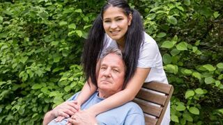 Sexual care for a girl by an old man outdoors