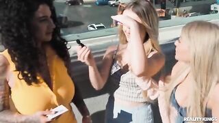 Two girls are stripping on the strip and caressing each other, two guys come in