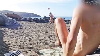 Two girls got caught by a wanking guy on the nude beach