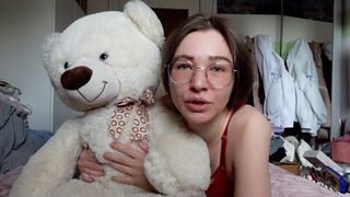 A cute girl has fun with her favorite teddy bear in POV