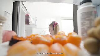 A redhead beauty has passionate sex after removing her suit, showcasing her youthful energy