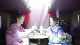 A chick has sex in the compartment and gets a good view