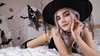 A cute witch in a Halloween costume waits for magical sex