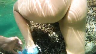Babe fucked in her ass underwater on the beach with a stranger