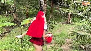 A little girl in a red riding hood dress knows how to handle things