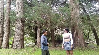 A pretty woman has sex with a man in the forest
