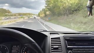 A girl is having fun with her boyfriend in the car