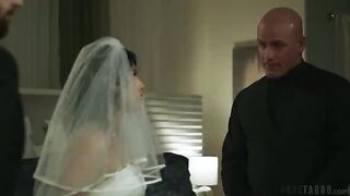 A brunette woman with a tattoo was fucked on the bed
