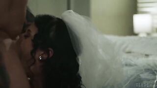 A brunette woman with a tattoo was fucked on the bed