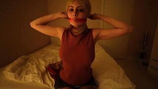 A sexy student in black stockings plays a thrilling game with her dildo